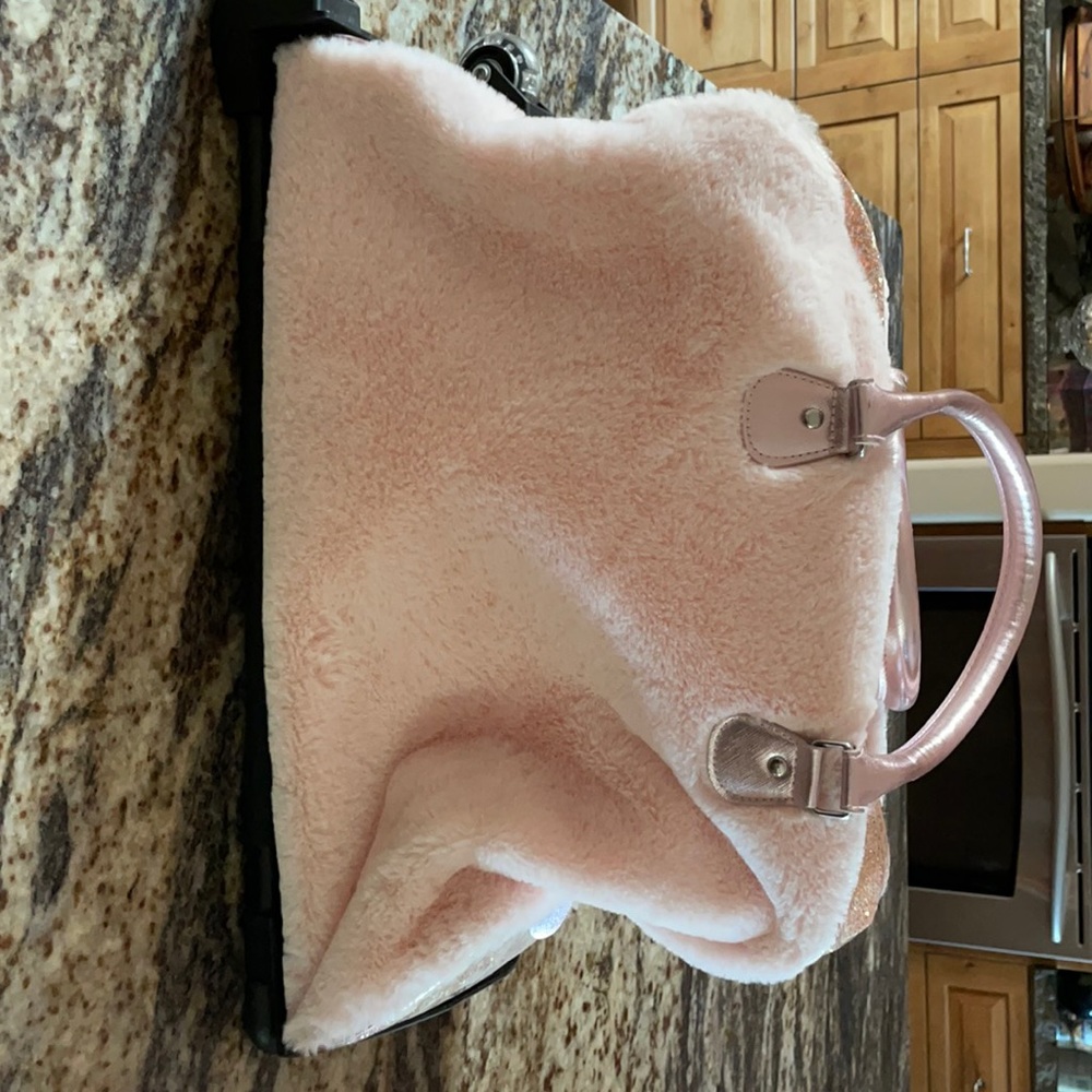 Girls Pink rolling duffel bag